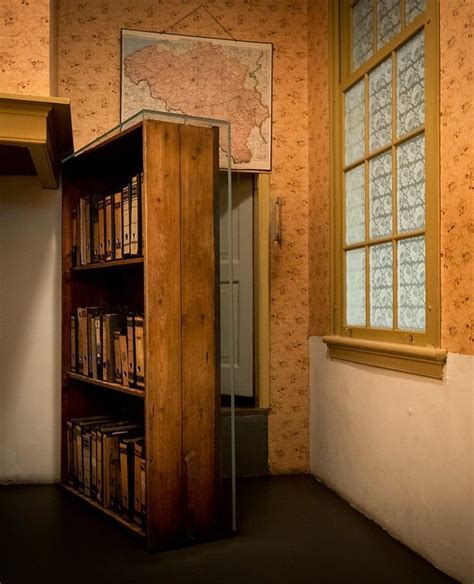 a typical day in the secret annex|anne frank bookcase entrance.